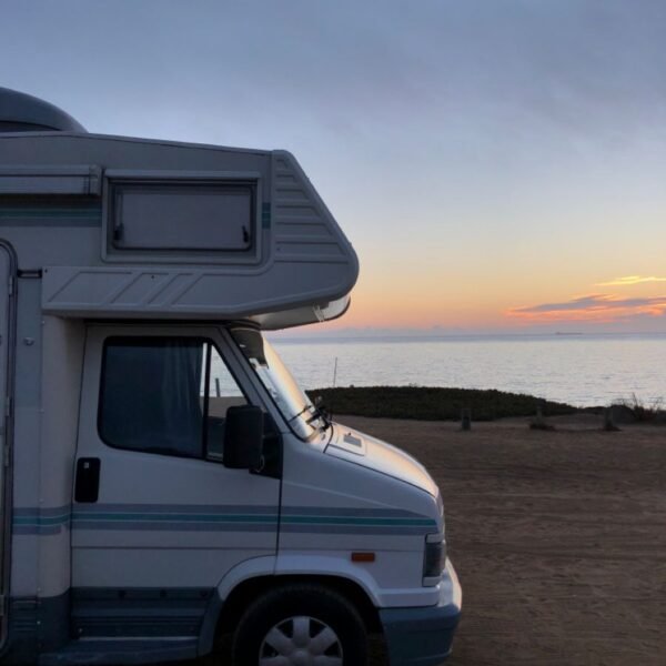 Static caravan overlooking the beach at sunset in Spain